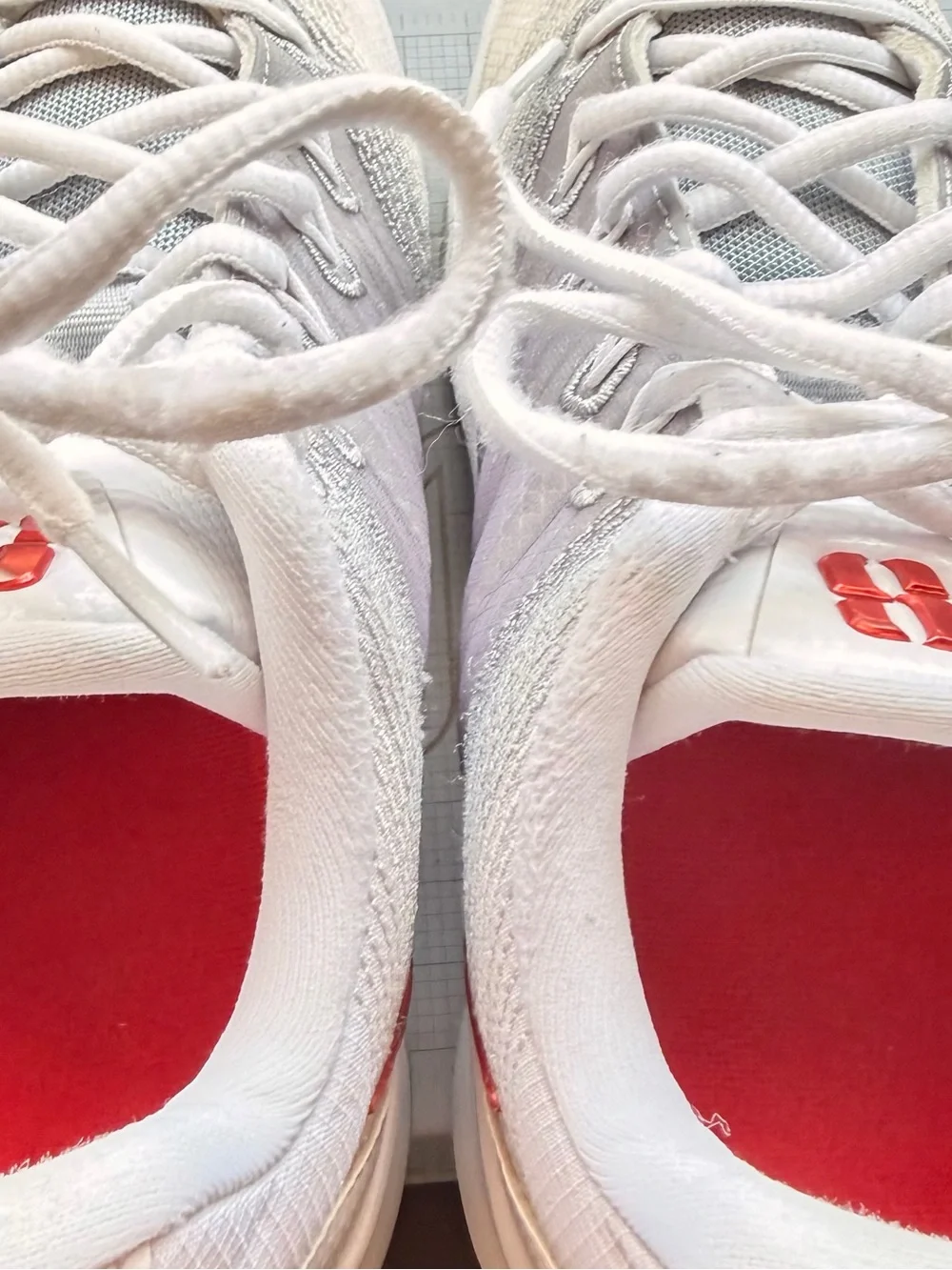 Nike youth White Athletic Sneakers with Red and Silver Swoosh